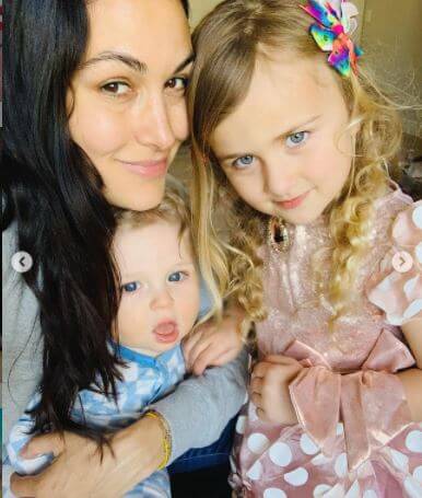 Buddy Dessert Danielson with his mother Brie Bella and sibling Birdie Joe Danielson